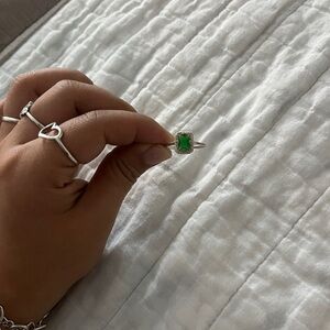 Silver ring with green gem